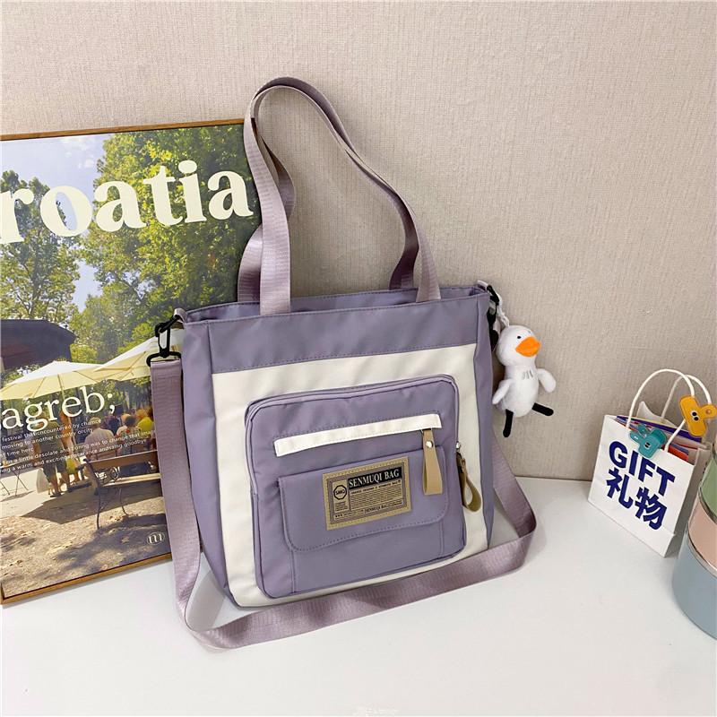 Canvas bag new large-capacity make-up bag dual-purpose tote bag women's schoolbag students junior high school high school canvas messenger bag