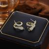 Exquisite Diamond-Encrusted Silver Snake Earrings – Luxurious, Unique Design with a Modern Style.