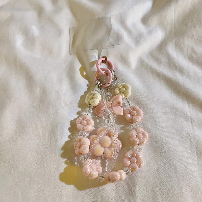 Bracelet de perles d'amour pour femmes, petit nœud en cristal frais, fleurs, amour, chaîne de téléphone portable, anti-chute, accessoires de coque de téléphone portable, DIY