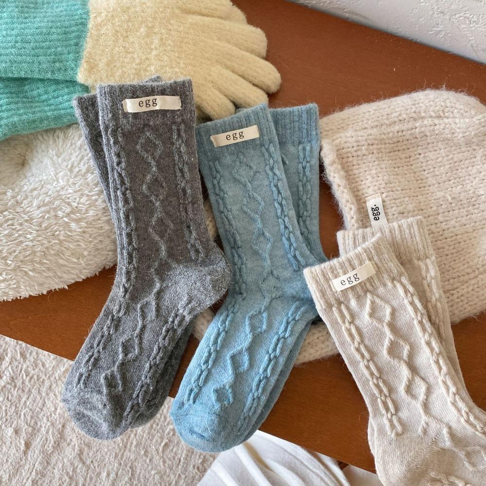 Chaussettes d'hiver épaisses coupe-vent pour femmes nouvelles chaussettes rayées torsadées
