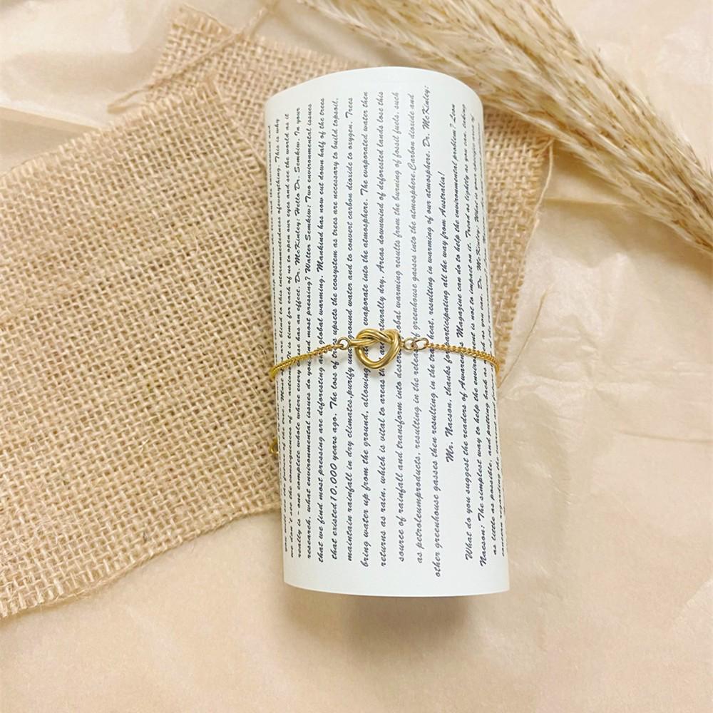 French-Inspired Gold Stainless Steel Heart Knot Bracelet for Women