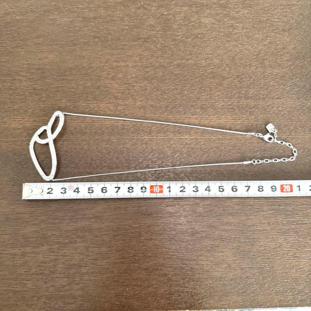 Used Good conditionSWAROVSKI Swarovski double oval necklace crystal silver color storage bag included