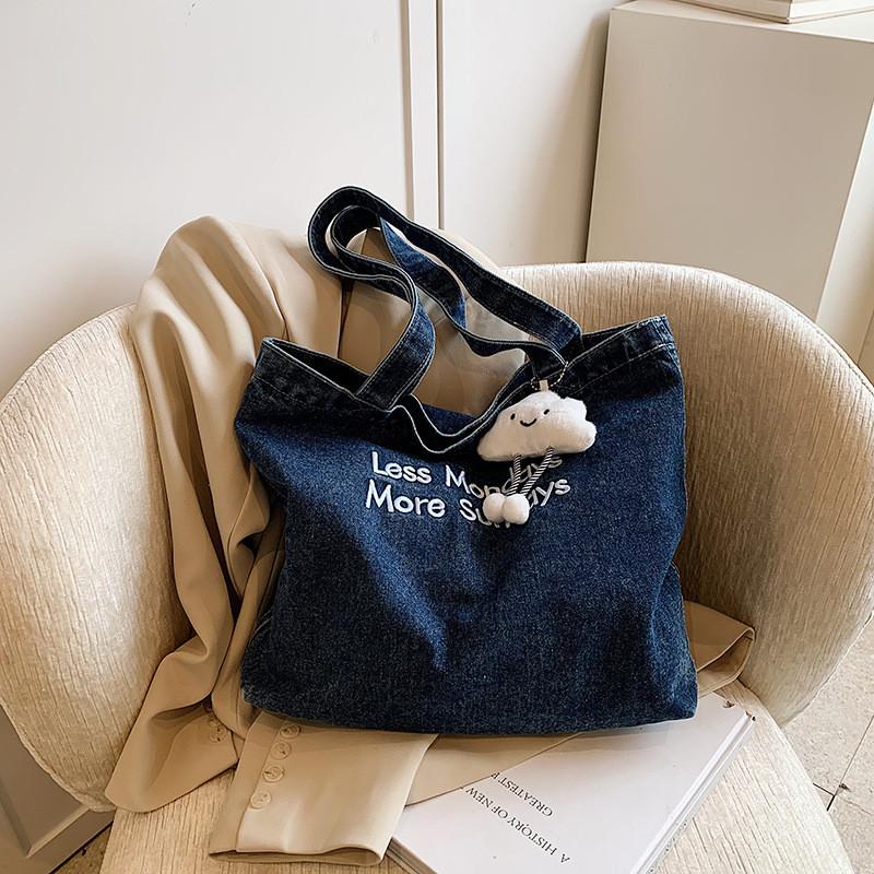 Fashionable Medium Sized Denim Tote Bag With Unique Stitching Details For Everyday Use