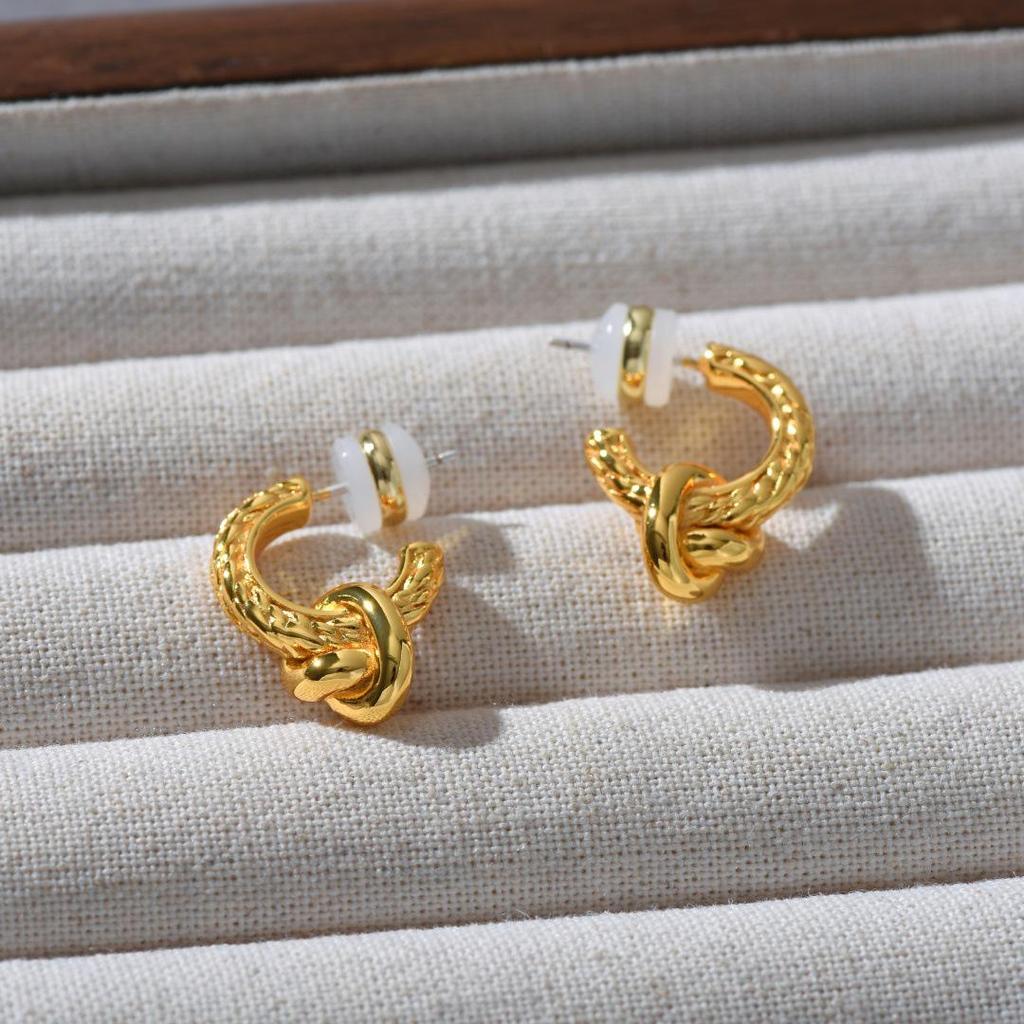 French Metal Knot Earrings with S925 Silver Needle, European & American Light Luxury Design, High-Class Temperament Studs.