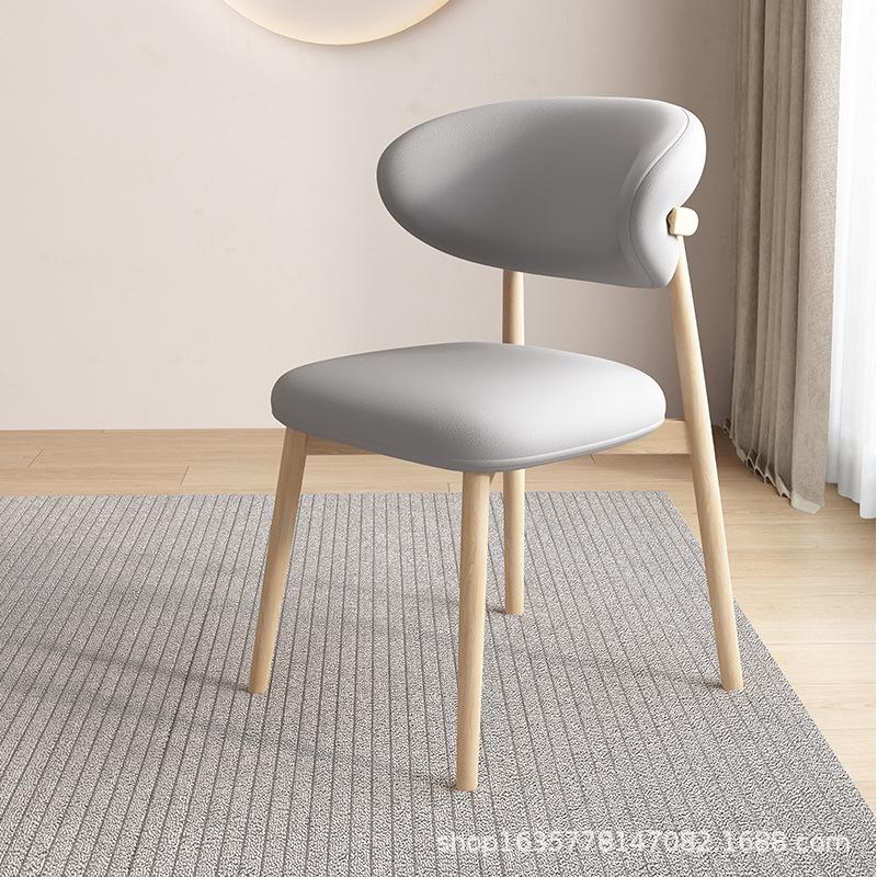 Nordic Modern Minimalist Solid Wood Dining Chair with Soft Pack Backrest - Comfortable Light Luxury Ram's Horn Design for Home, Restaurant, and Hotel.