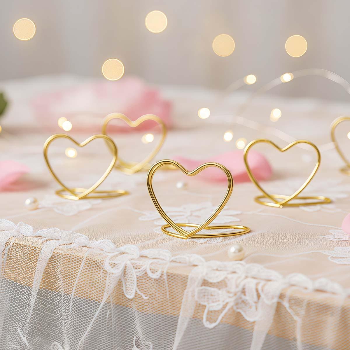 

50 PCS Gold Table Number Place Card Holders, Small Heart Shape Card Stand for Wedding Mini Photo Playing Cards Holder Picture Photo Menu Card Clips 50pcs