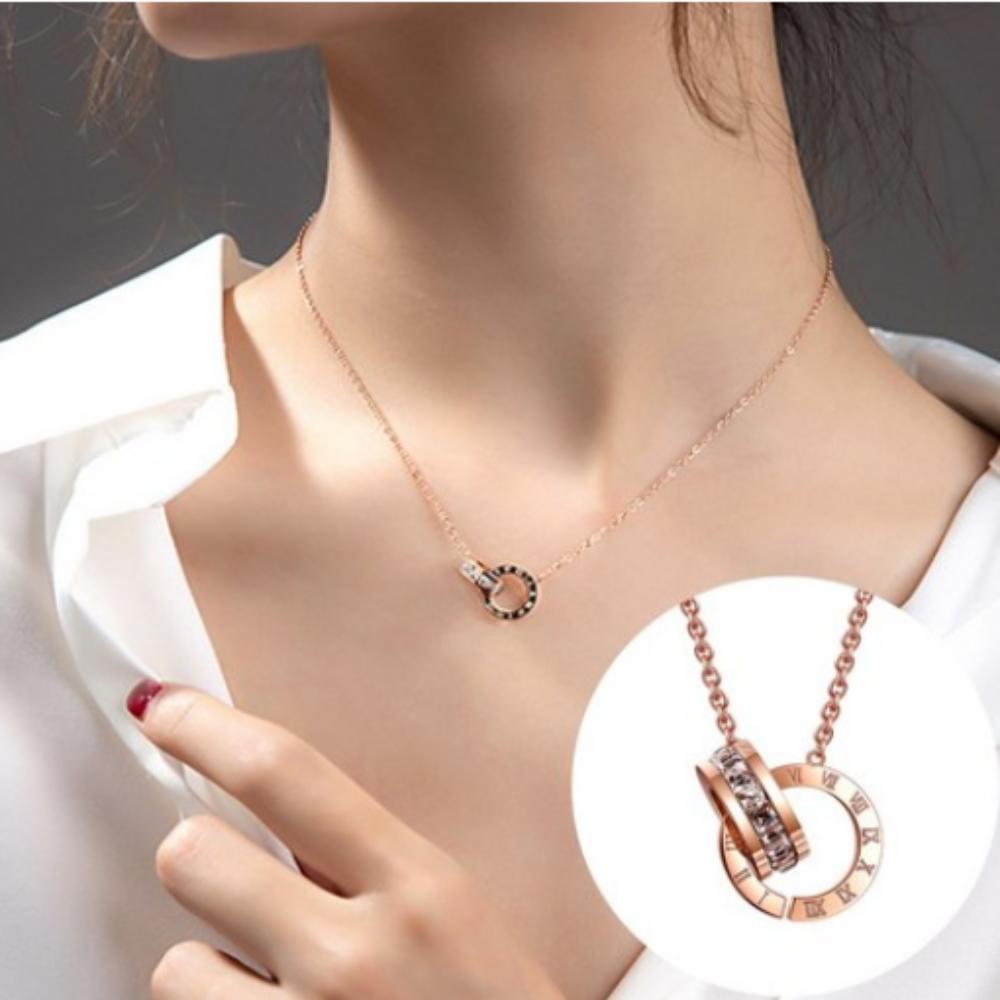 

Voyager Titanium Rose Gold Cross Ring Necklace