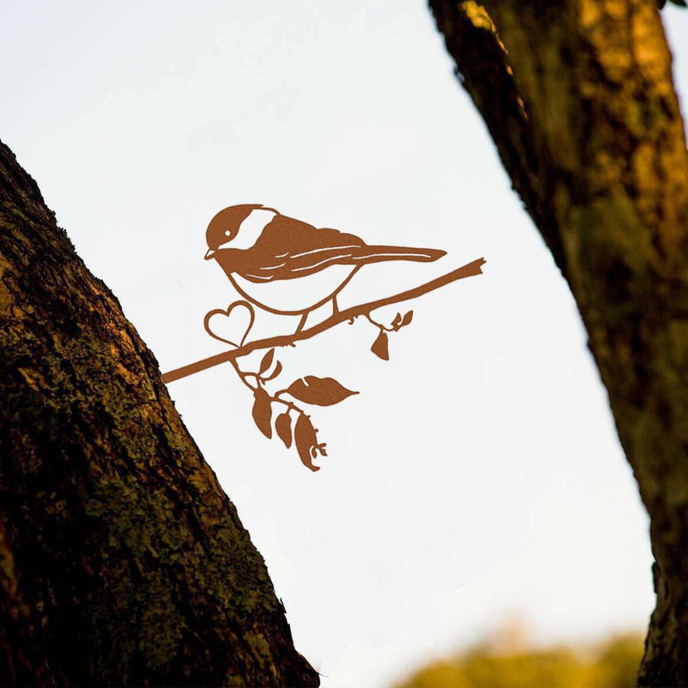 Väggkonst med silhuett av en fågel på en gren i stål - Gör ditt hem unikt med denna tavla. Perfekt för trädgården, uteplatsen och födelsedagspresent