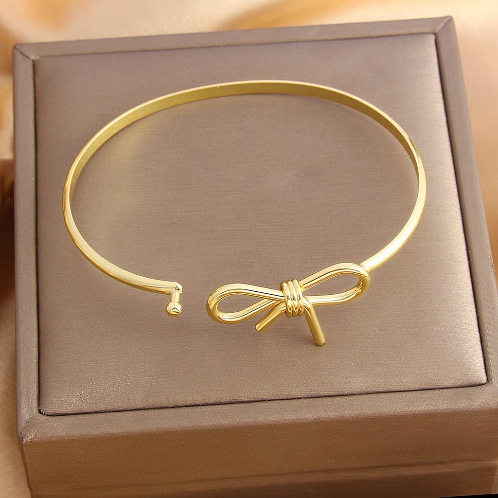 Sweet and Simple Electroplated Smooth Surface Bow Bracelet - Luxurious Design, Fashionable Wristband