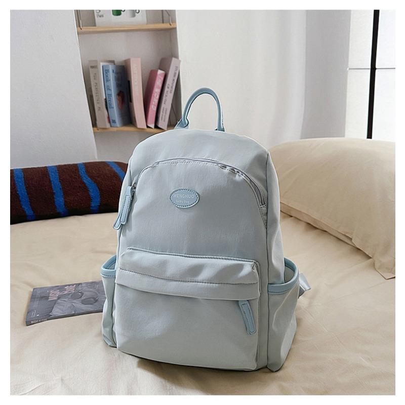 Fresh and sweet candy color backpack for junior high school students, solid color, simple and large-capacity backpack.