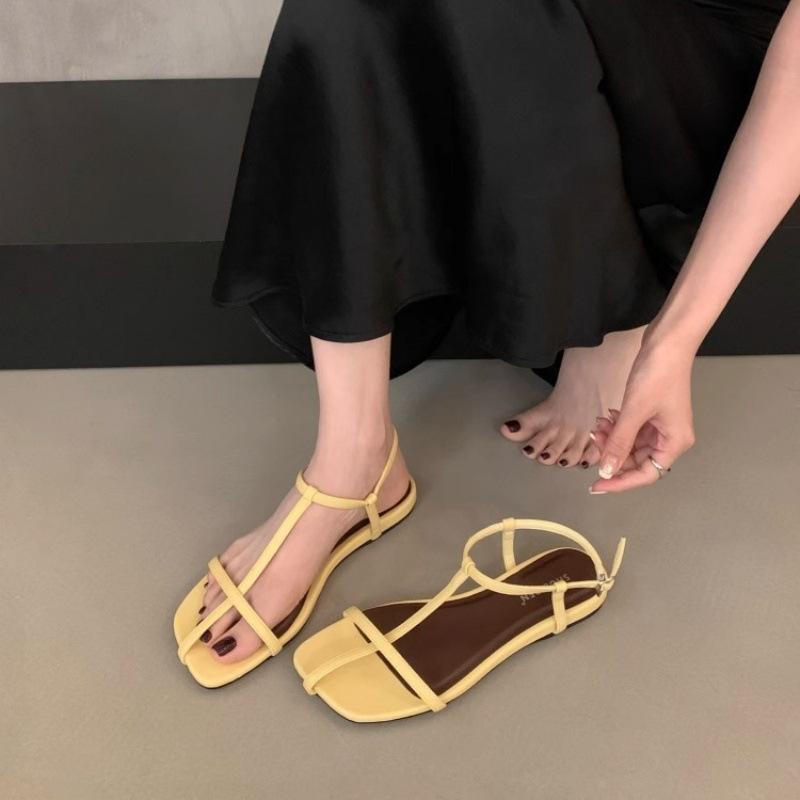 French flat-bottomed thin-strapped sandals women's shoes 2025 new summer Korean version versatile minimalist beach shoes Roman shoes