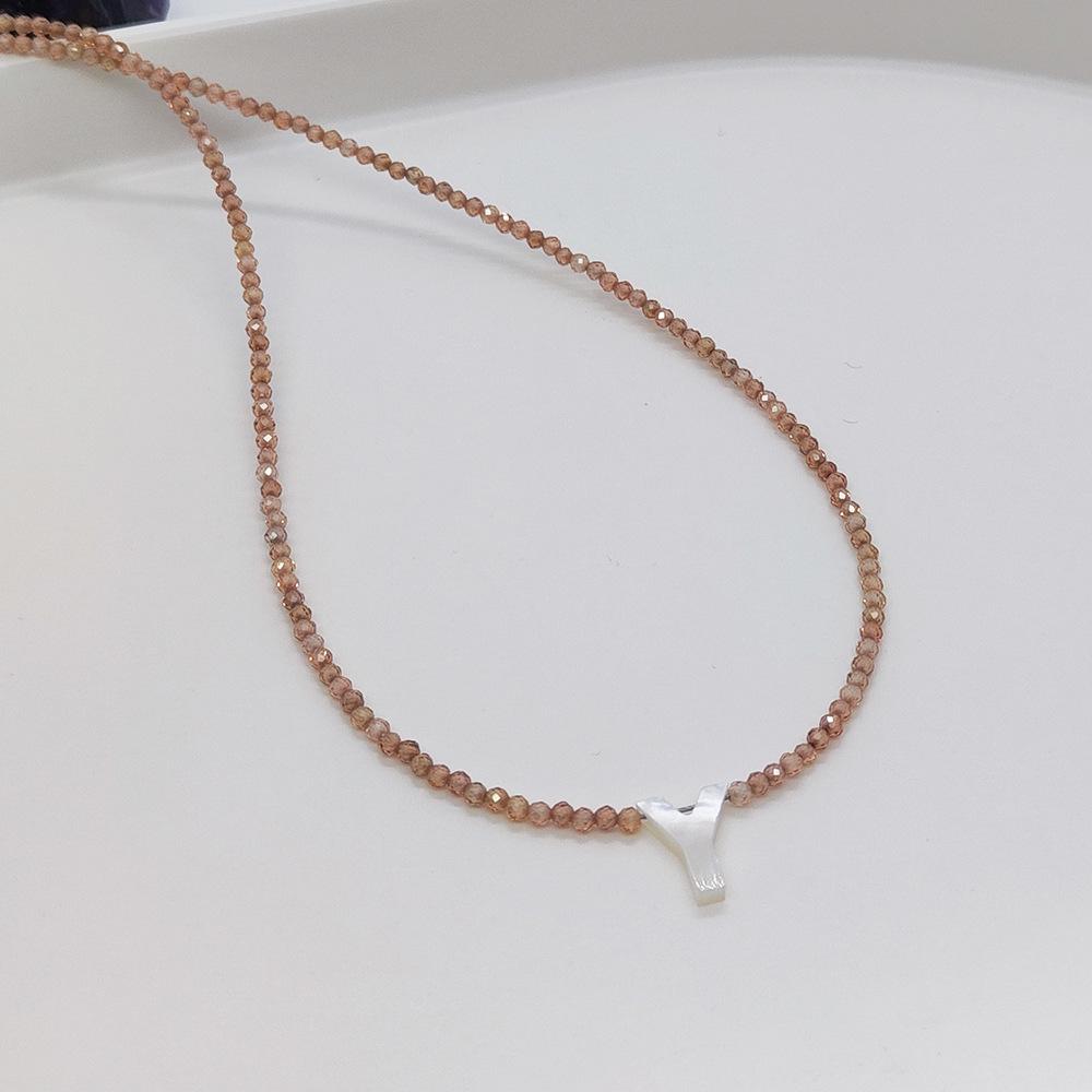 Elegant 2m Zircon Beaded Clavicle Chain: 26-Letter Deep Sea Shell Necklace for Women.