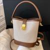 Niche retro tas dames nieuwe high-end veelzijdige draagbare emmertas splicing schouder crossbody tas