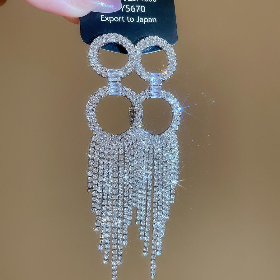 Silver Needle Water Drop Tassel Earrings - Light Luxury High-End Design for Women's Fashion.