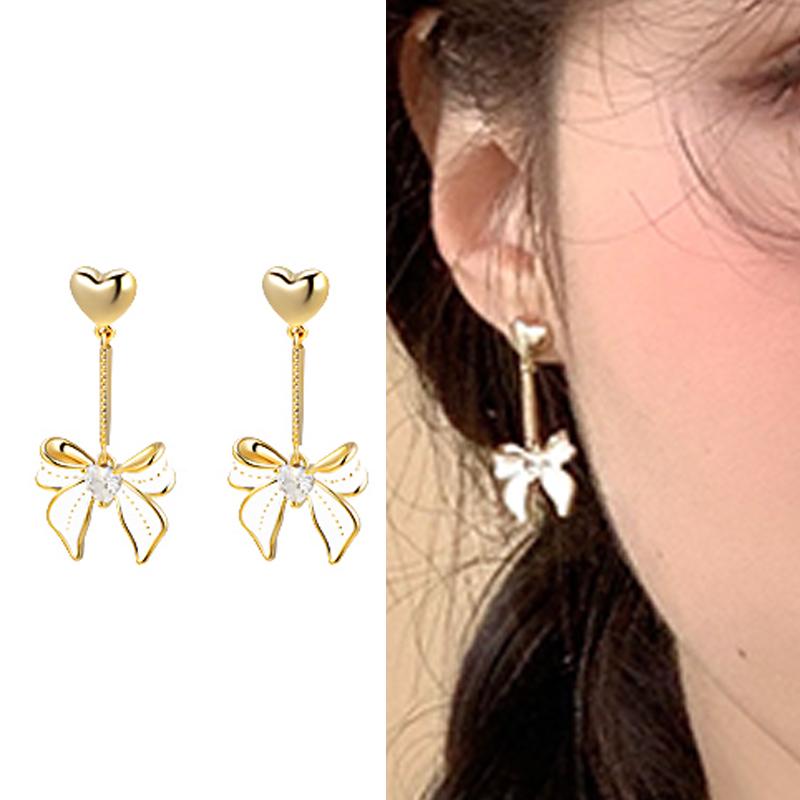 

Модные длинные серьги-капли с кистями в форме сердца и бантом