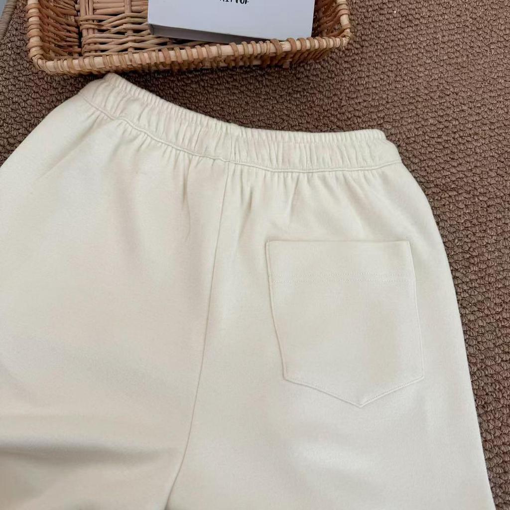 Dámské zimní ležérní tepláky s širokými nohavicemi a středním pasem, zdobené nýty