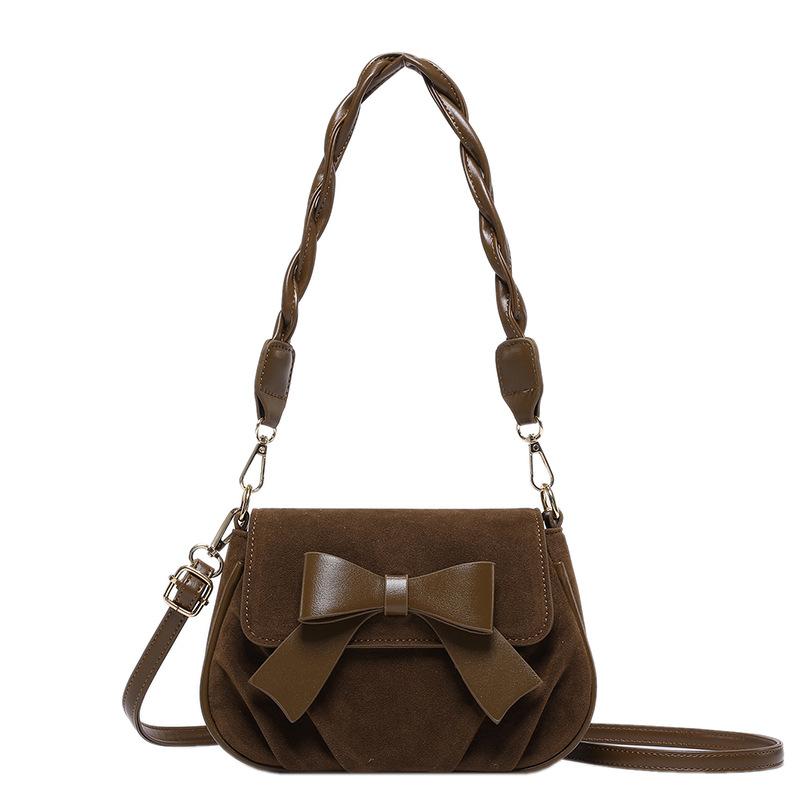 

Bow solid color saddle bag women s new autumn and winter retro fashion casual simple twist shoulder strap messenger bag