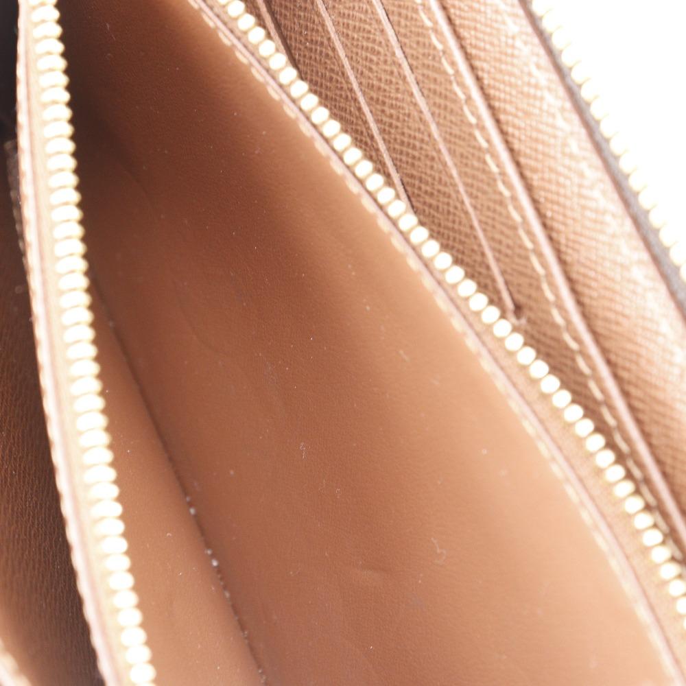 LOUIS VUITTON Zippy wallet Purse M42616 Brown Monogram canvas unisex Used