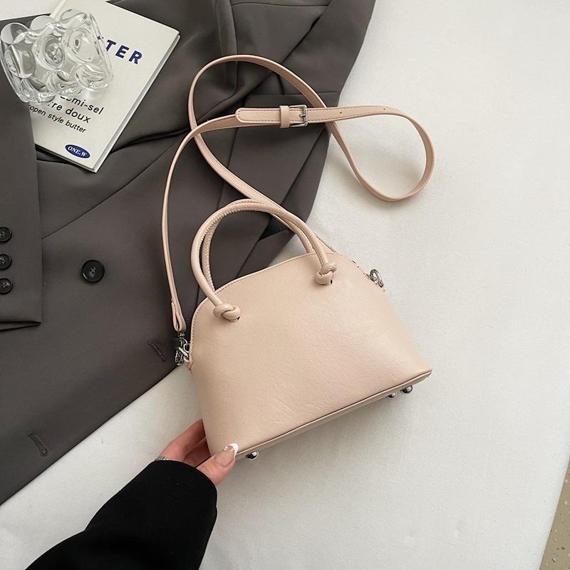 Niche light luxury portable shell bag women's new high-end retro fashion shoulder messenger bag