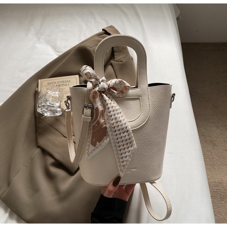 Casual bucket bag women's bag 2025 summer new Korean version of the vegetable basket bag hand-to-shoulder crossbody commuter bag