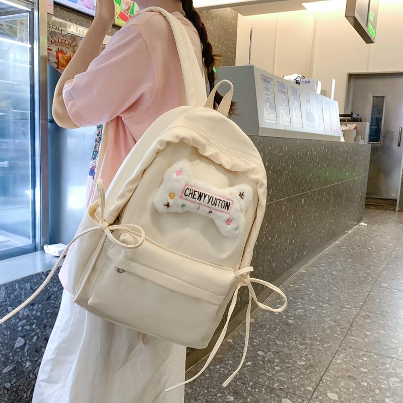 Cute girl versatile casual backpack this year popular solid color simple junior high school student schoolbag girls backpack