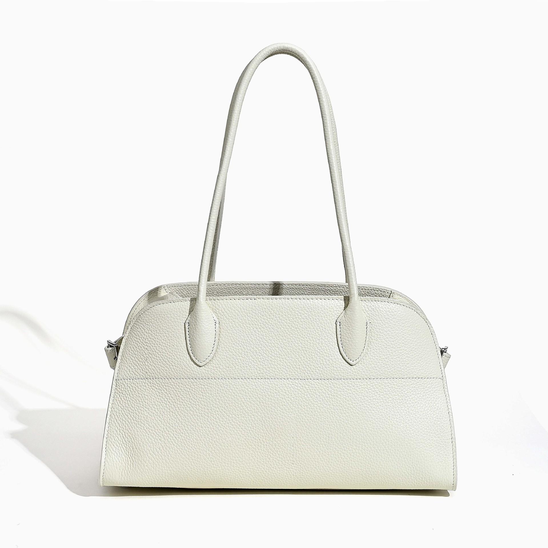 

2025 Новый стиль Сумка-багет из натуральной кожи коровьей кожи высшего слоя Женская сумка Большой вместимости Повседневная сумка Сумка-тоут с длинной ручкой 37x17x21cm белый