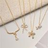 18K Gold Copper Necklace with Diamonds & Zirconia Bow Design