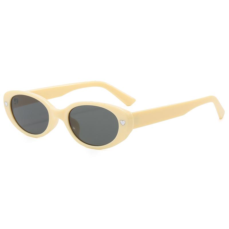 

Hot Selling Premium Quality Oval Frame Elegant Sunglasses with Heart Decor UV400 Protection Sun Glasses for Outdoor Vacation as pictures