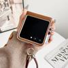 Fashionable Bowknot Motorola Razr60 Drop-proof Foldable Phone Case with Anti-lost Rope.