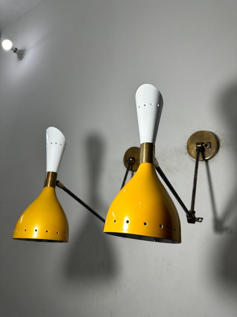 

Mid Century Modern Brass Diabolo Wall Sconce - Italian Design