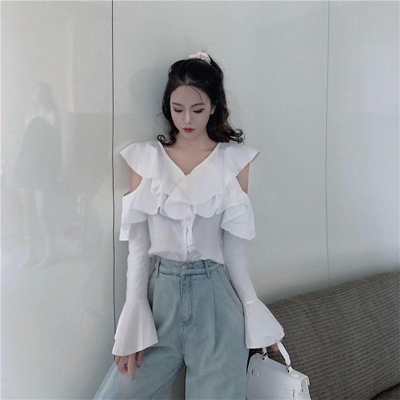 Autumn new flared sleeve shirt women's V-neck ruffle edge shirt pure desire wind hollow off the shoulder loose and thin top