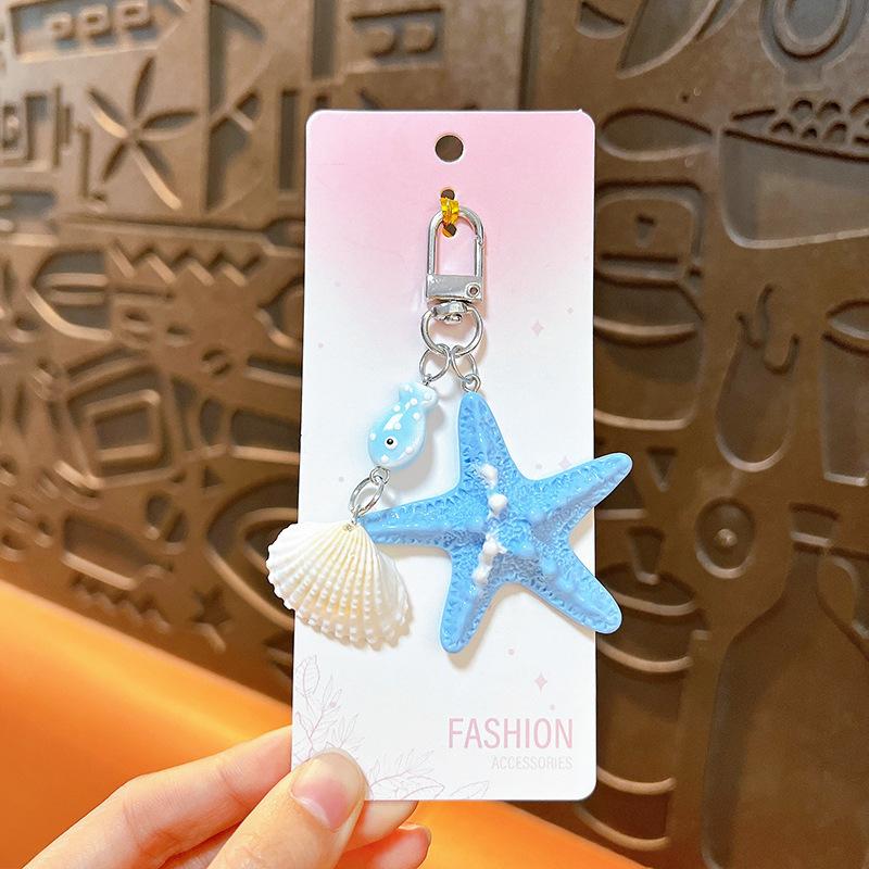 

Seaside Beach Shell Mini Backpack Hanging Handbag Pendant Bag Pendant Bags Accessories one size синий