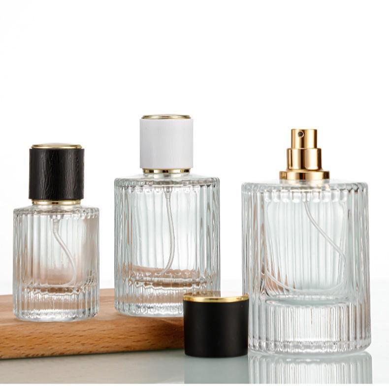 High-Grade Transparent Spray Bottle: 30ml with Vertical Stripes & 50ml Round Bottom Perfume Bottle with Screw Cap