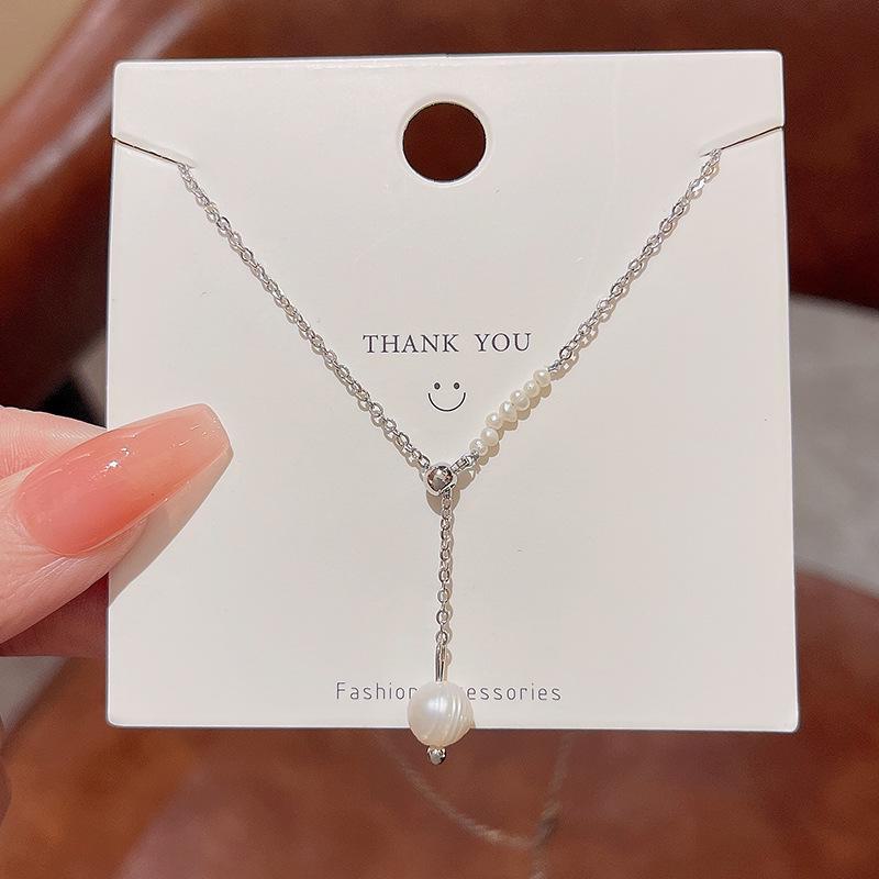 "Elegant Korean Titanium Steel Zircon Bow Necklace for Women"
