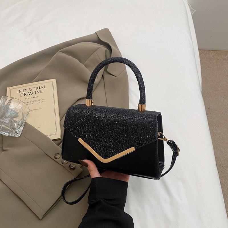 

French niche fashion women s bag 2025 new armpit bag splicing commuter handbag oblique span bag tide чёрный