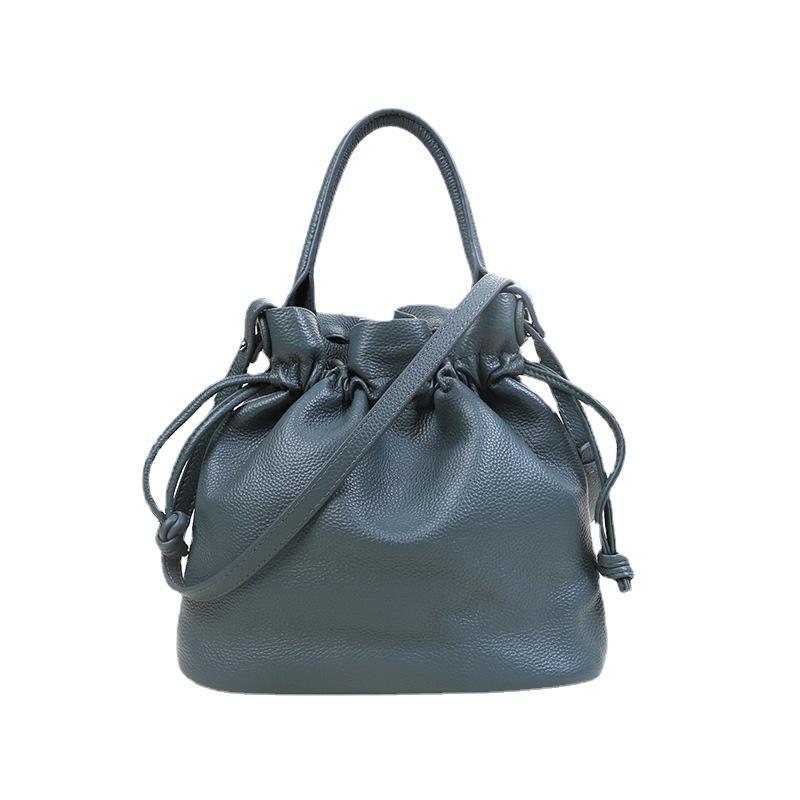Women's Classic Fold Leather Bucket Bag: New Style, First Layer Cowhide, Trendy Solid Color Handheld Design