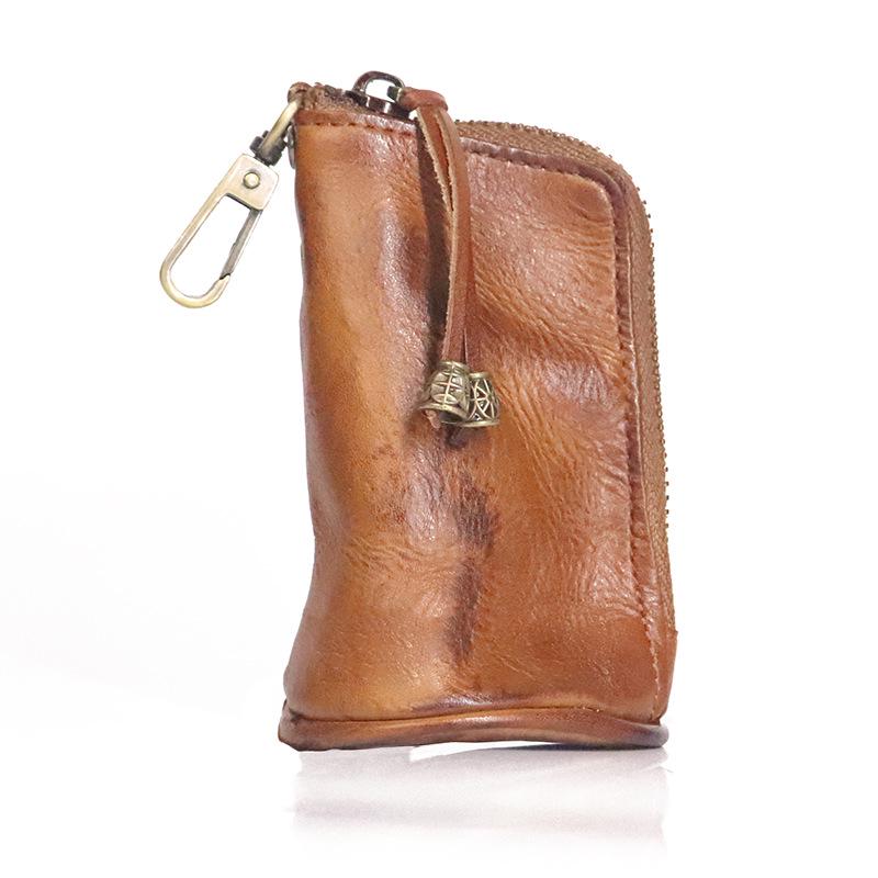 Men's Retro Genuine Leather Waist Key Holder: Large Capacity Cowhide Bucket Bag with Multifunctional Zipper Pouch.