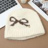 Sweet and cute bow jacquard knitted cold hat autumn and winter literary and versatile big head circumference wool hat cold-proof warm hat