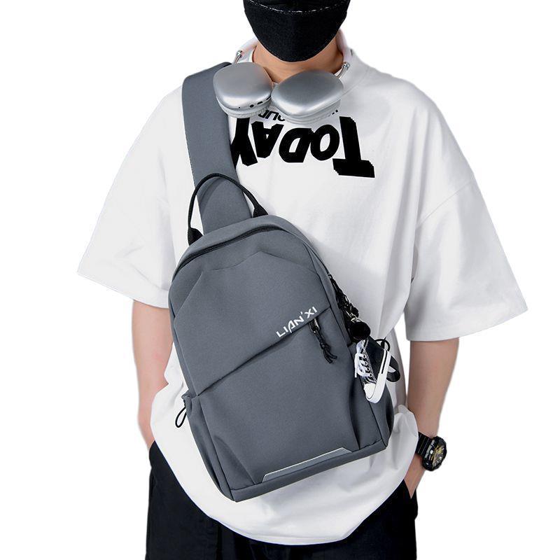 Pánská a dámská japonská trendová všestranná taška přes hruď a crossbody - ležérní cestovní a sportovní batoh