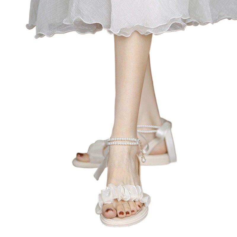 2025 Sommer neu ein Wort mit Mesh Französisch mit Rock Feenstil Internet-Berühmtheit Perle niedriger Absatz flache Sandalen Frauen