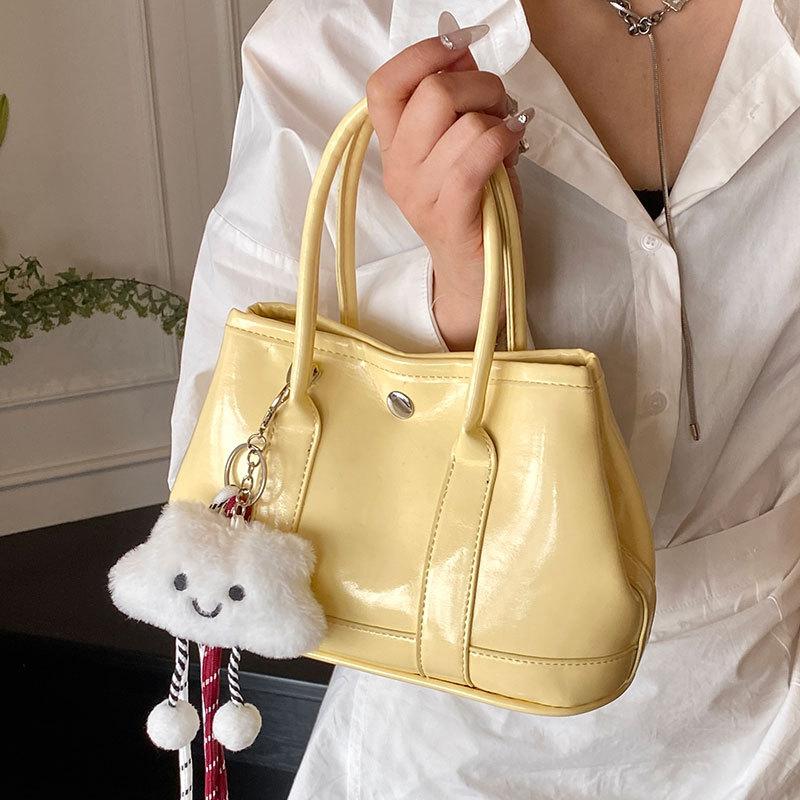 Korean New Product Sweet Cream Style Casual Portable Small Bag Temperament Versatile Simple Solid Color Commuter Messenger Women's Bag