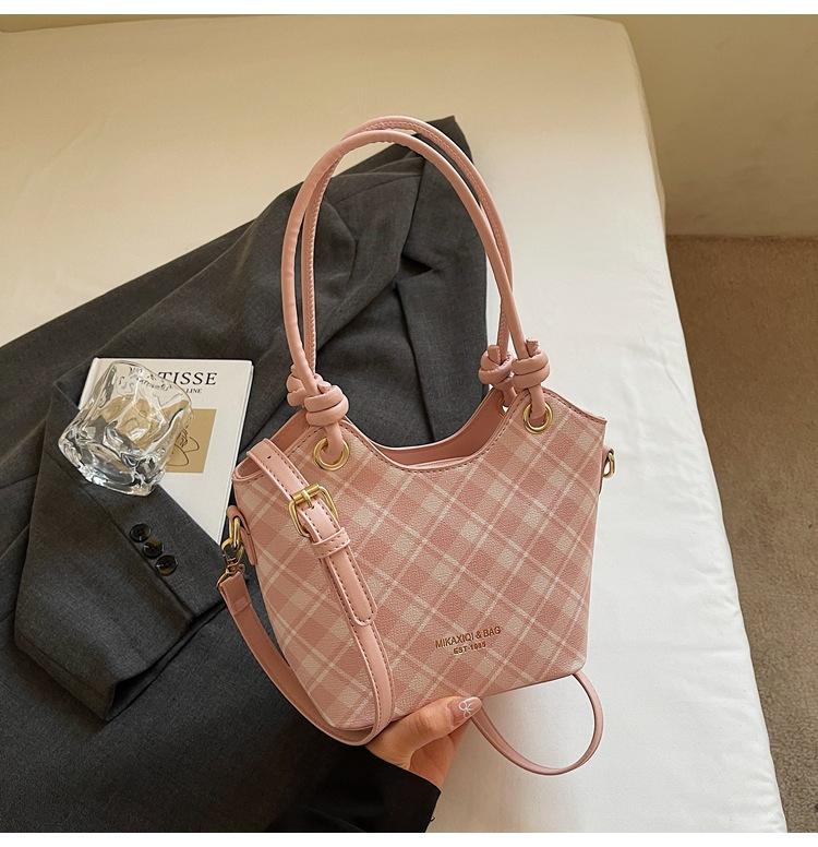 

Premium temperament commuter bucket bag 2025 new women s popular retro tote messenger bag this year