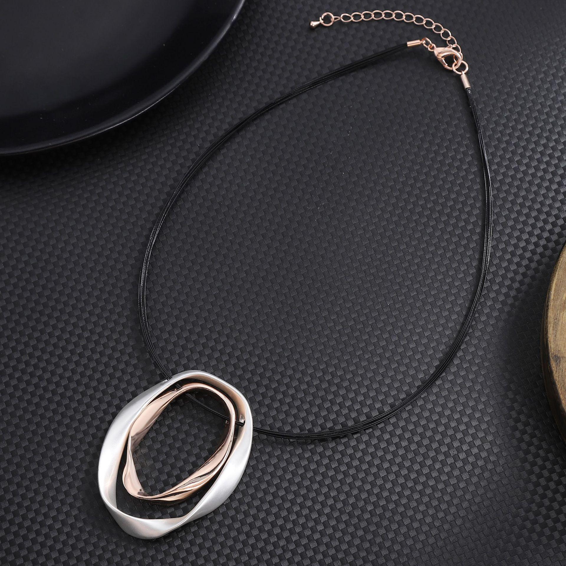 

Неправильный полый овальный кулон из сплава, женское геометрическое ожерелье из стальной проволоки с высоким чувством стиля