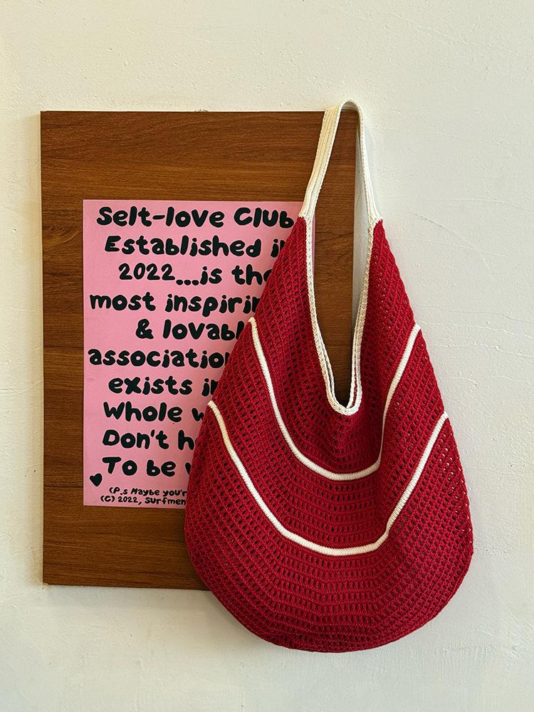 

Korean large-capacity hollow knitted bag 2025 new seaside vacation woven bag niche commuter versatile shoulder bag красный