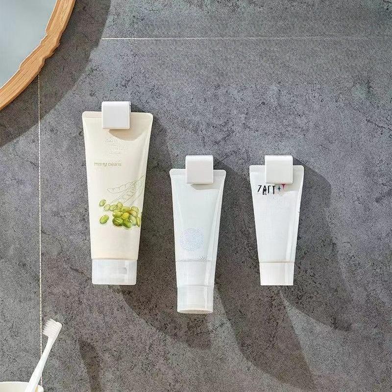 Toothpaste Holder - Wall-mounted Bathroom Storage Hook Without Drilling - Simple Design for Washbasin - Compact Toothpaste and Soap Rack