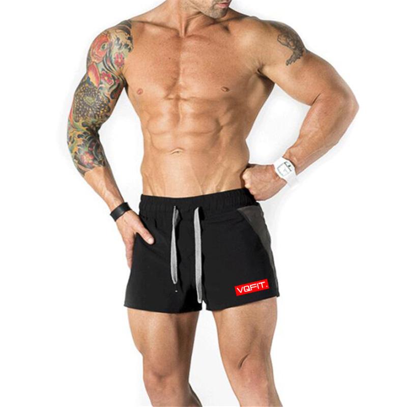 Muscleguys Summer Gyms Shorts Men Bermuda Beach Hot Cargo Simple Patchwork Solid Men Board Shorts Male Brand Fitness Mens Shorts