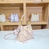 Women's Large Capacity Single Shoulder Bucket Bag with Inner Lining, Compartment Organizer, and Zippered Middle Section.