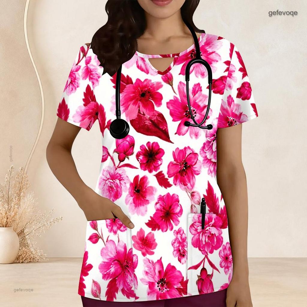 Top de uniforme rosa floral para mujer de talla grande, cuello con ojo de cerradura, manga corta, con bolsillos delanteros