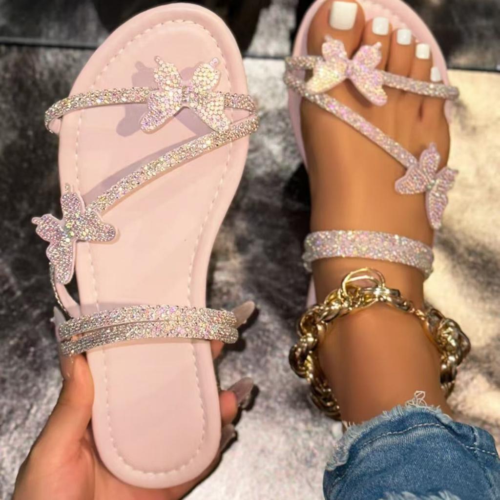 Cool slippers women's outer wear 2025 new summer butterfly rhinestone belt beach shoes versatile one-pedal flat sandals