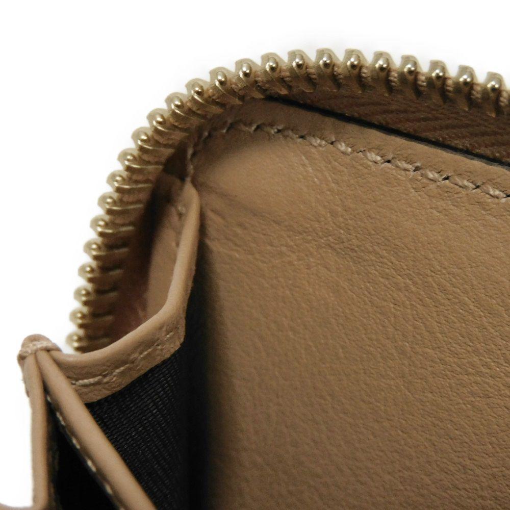 Used Guccissima Coin Purse 9539 544249 BMJ1G 2754 7943 with Embossed Double G Logo and Zip Around Closure, Micro GG